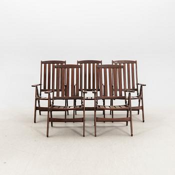 A set of five stained wood garden chairs from KWA around year 2000.