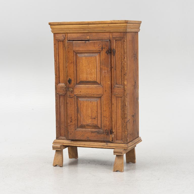 A pinewood cabinet, 18th Century.