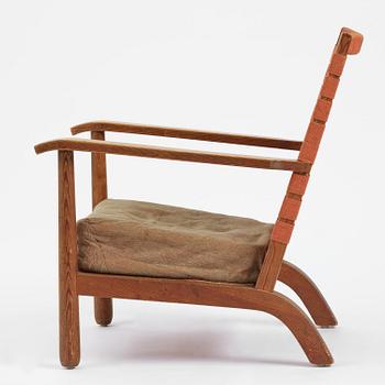 Axel Einar Hjorth, a stained pine "Väddö" easy chair, Nordiska Kompaniet, Sweden, 1930s-40s.