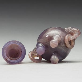 An amethyst tripod censer with cover, China, early 20th Century.