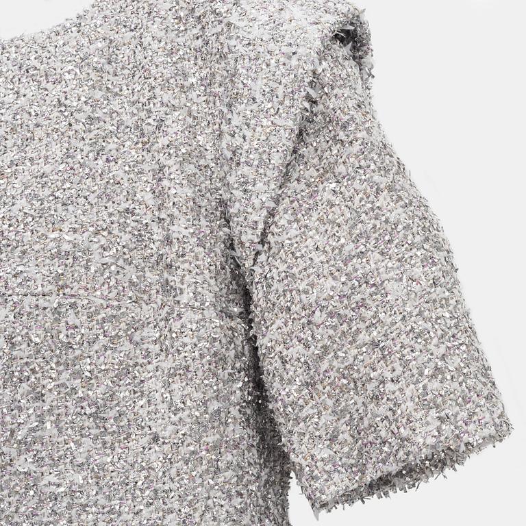Chanel, a bouclé silver dress, size 34.