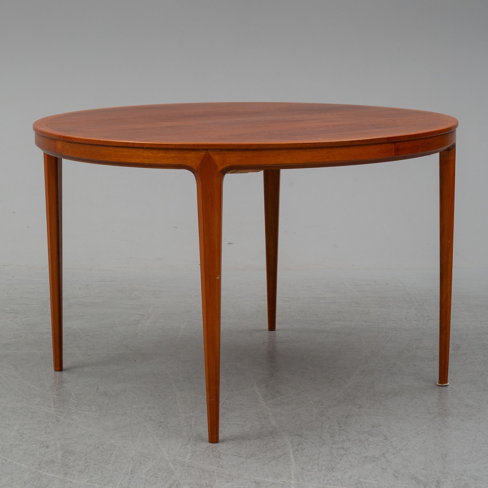A set of table and chairs by Bertil Fridhagen for Bodafors.