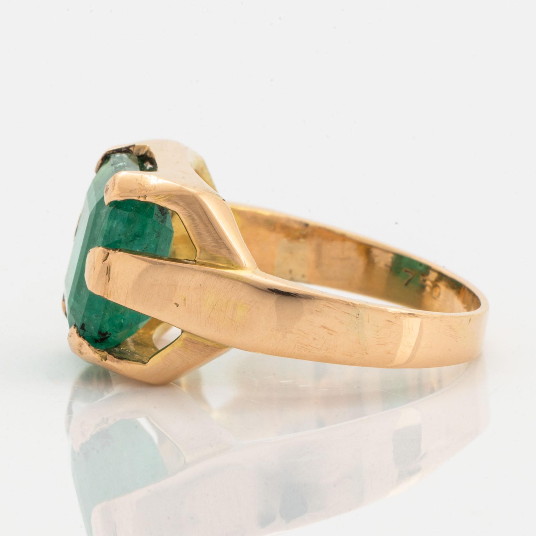 Emerald-cut emerald.