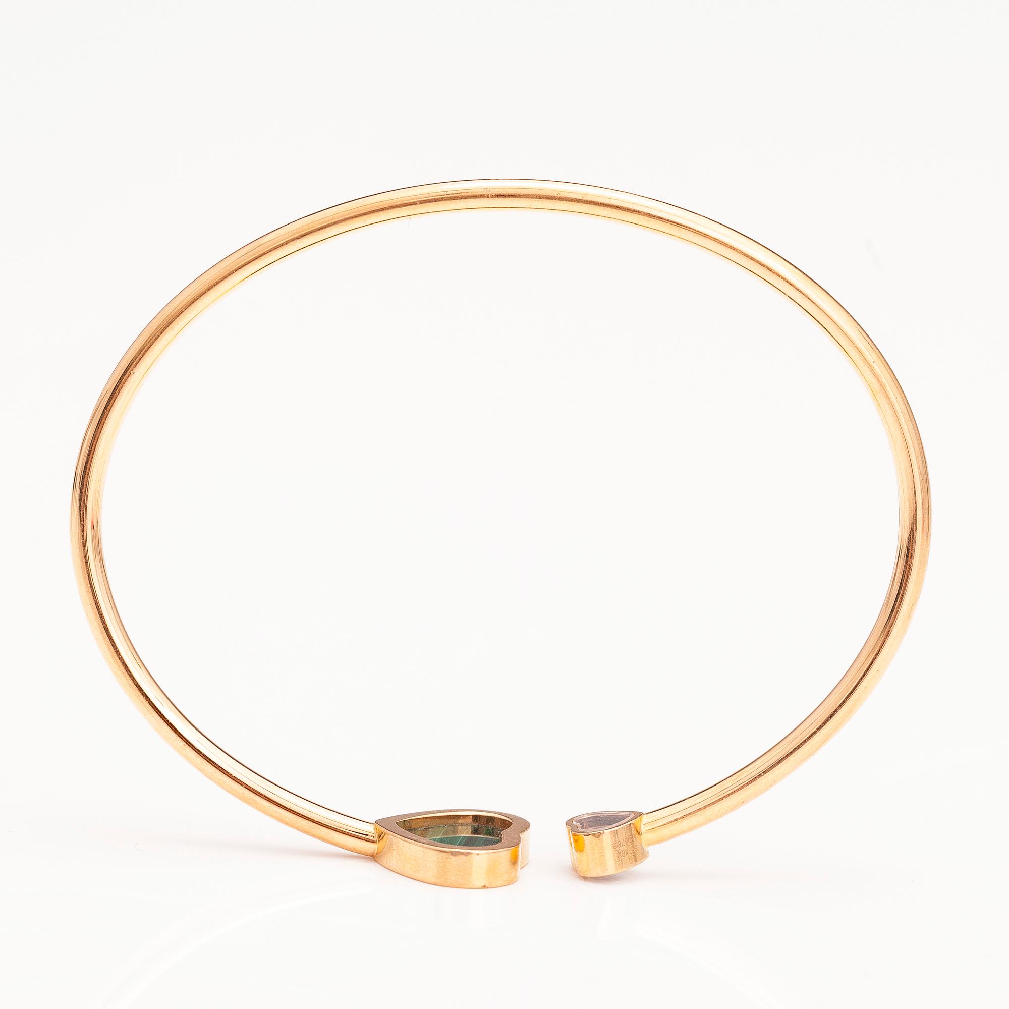 CHOPARD. A 18K gold bracelet "Happy hearts" with a diamond and malakite. Marked 857482, 6508783 and Made in Germany.