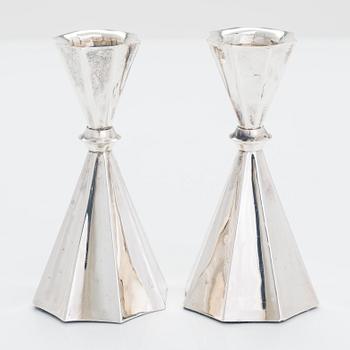 A 2-arm silver candle holder and a pair of silver candlesticks, Anna-Greta Eker and Hopearae Lasander, Turku 1965, 1963.