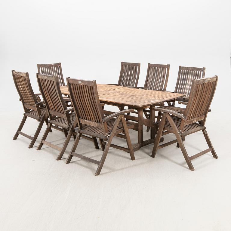 A 9 pcs stained teak garden suite by Brafab around 2000.