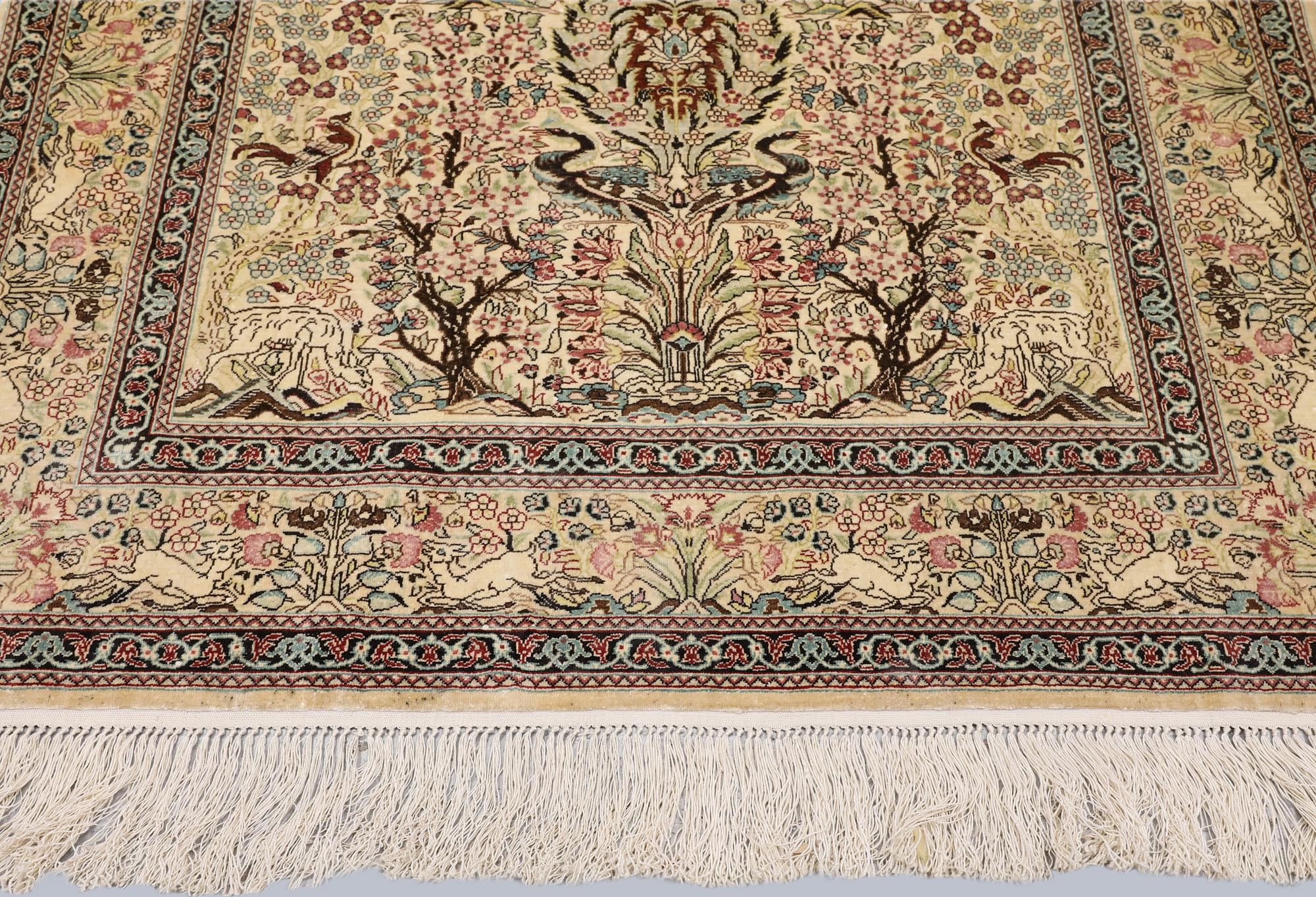 A Oriental silk carpet, 152 x 94 cm.