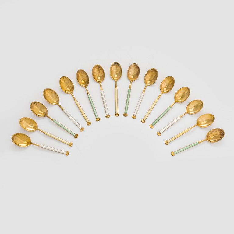 A set of 15 spoons, gilt sterling silver and enamel, Aksel Holmsen, Norway.