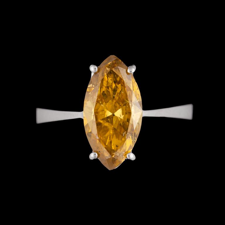 A marquise cut fancy greenish yellow diamond ring 2.46 cts.