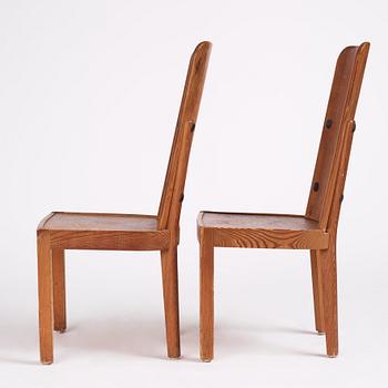 Axel Einar Hjorth, a pair of stained pine 'Lovö' chairs, Nordiska Kompaniet, Sweden 1930s.