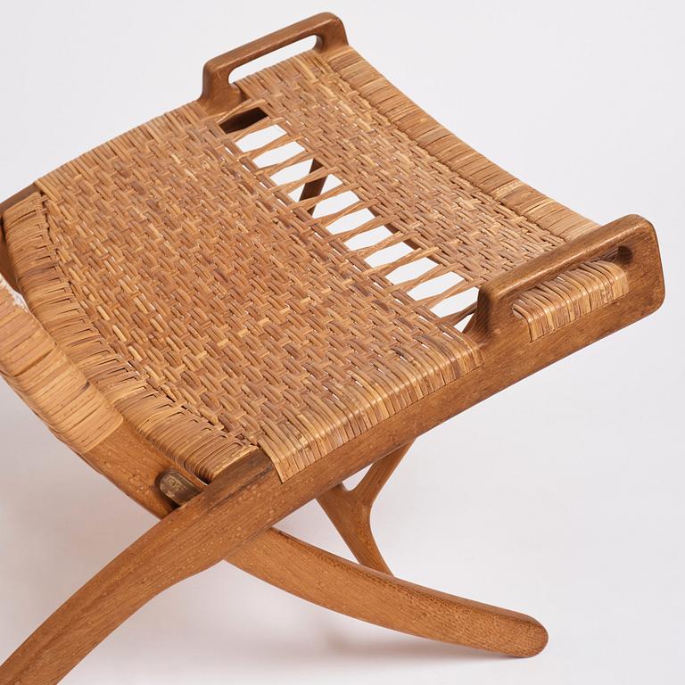 Hans J. Wegner, a pair of oak and rattan folding chairs 'JH-512', Johannes Hansen, Denmark 1950-60s.