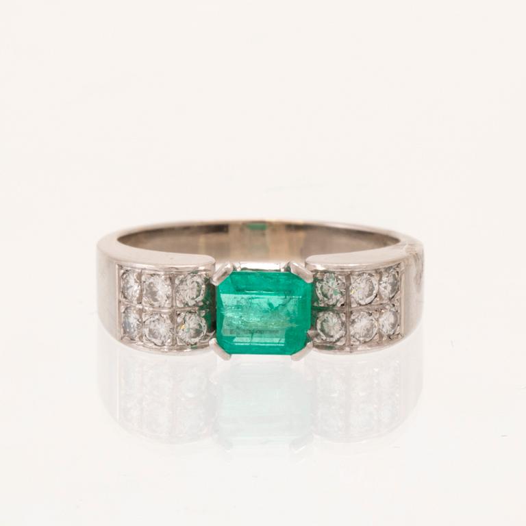 W.A. Bolin, ring 18K white gold with a rectangular step-cut emerald and round brilliant-cut diamonds, Stockholm 1976.