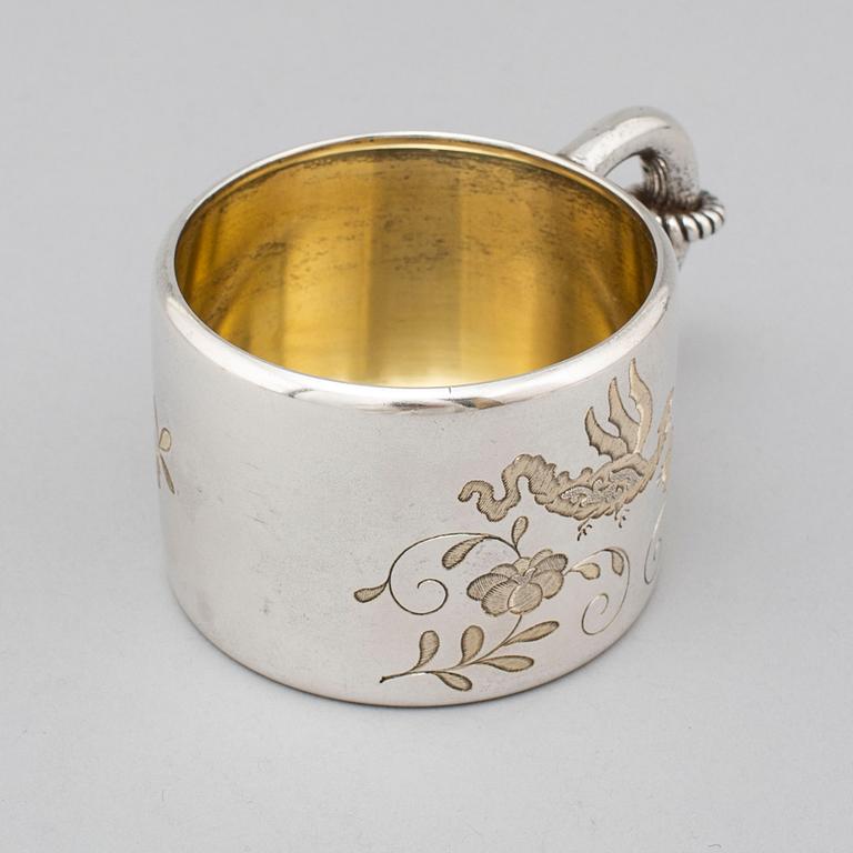 A Russian 19th century parcel-gilt silver mugg, mark of Mikhail Gratchev, St. Petersburg 1895. Imperial Warrant.