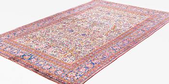 A carpet, semi-antik, silk Kashan, ca 315,5 x 204 cm.