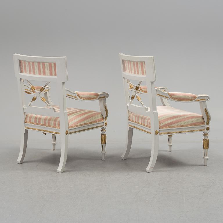 A set of two armchairs, a sofa, a stool and a chair. Early 20th century.