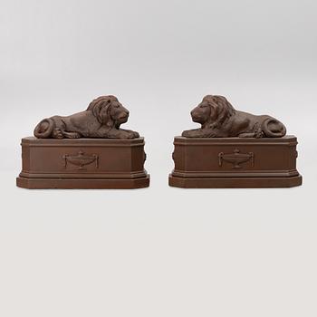 A pair of garden sculptures.