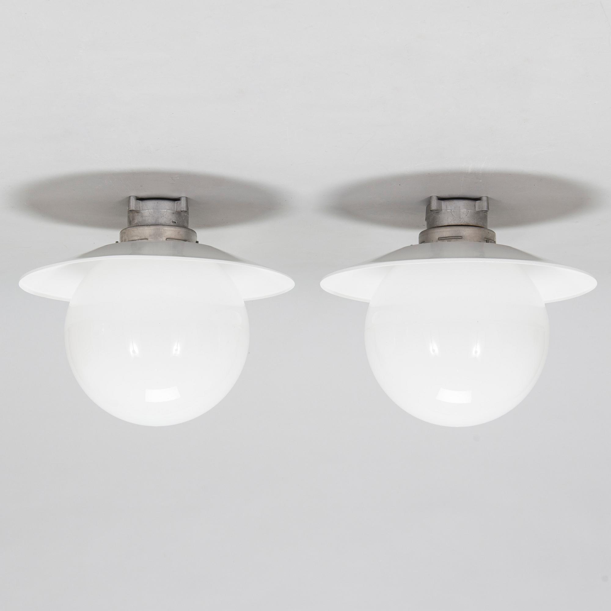 Paavo Tynell, a pair of mid-20th century outdoor  wall lamps for Idman Finland.
