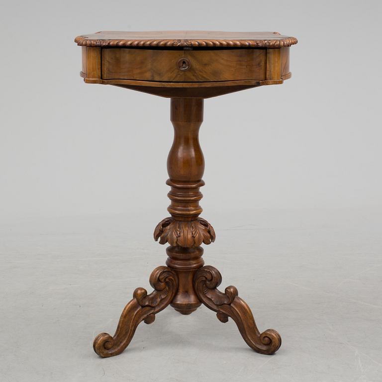 A mid 19th century sewing table.