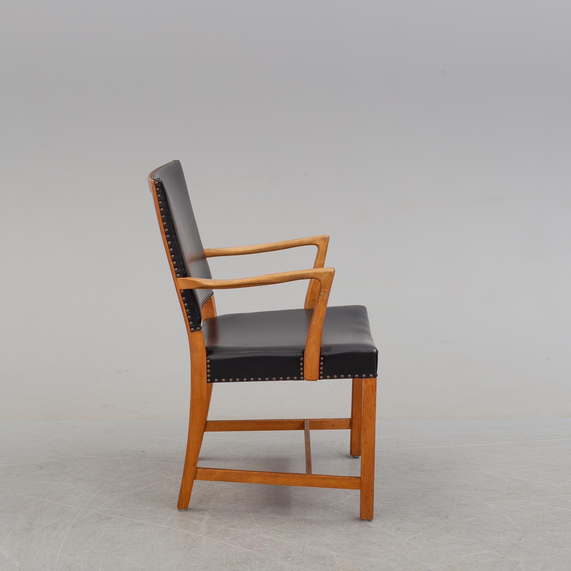 A late 20th century arm chair by Karl Erik Ekselius, JOC.