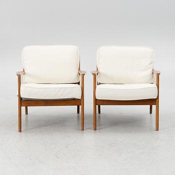 Folke Ohlsson, a pair of "USA 75" armchairs, Dux 1960s.