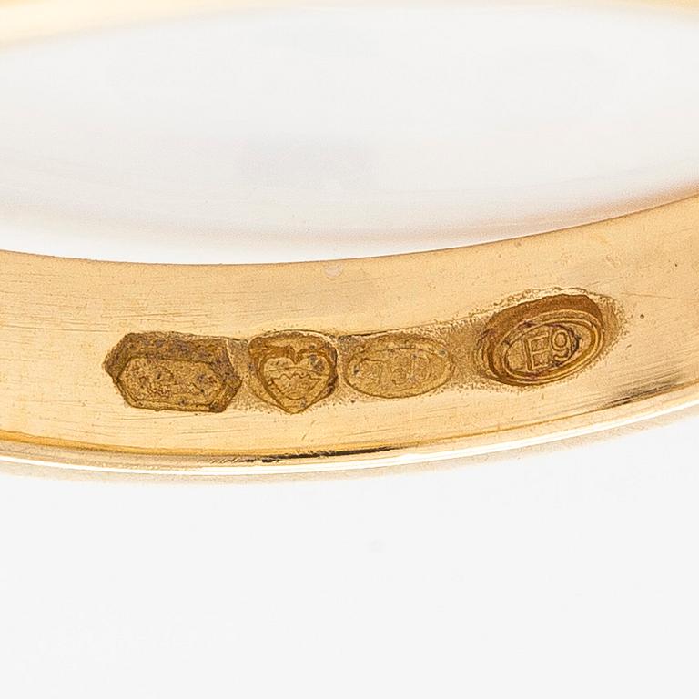 Ring, solitär, 18K guld med en briljantslipad diamant.