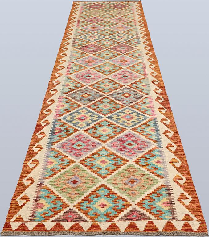 A Kilim runner, approx. 388 x 85 cm.