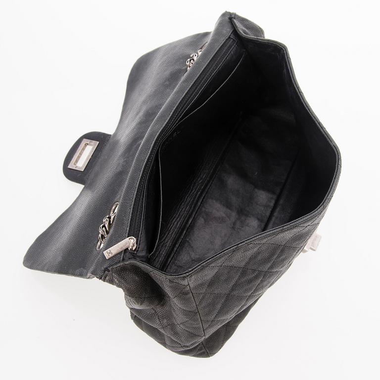 CHANEL Caviar Reissue 2.55 Jumbo Single Flap Bag.