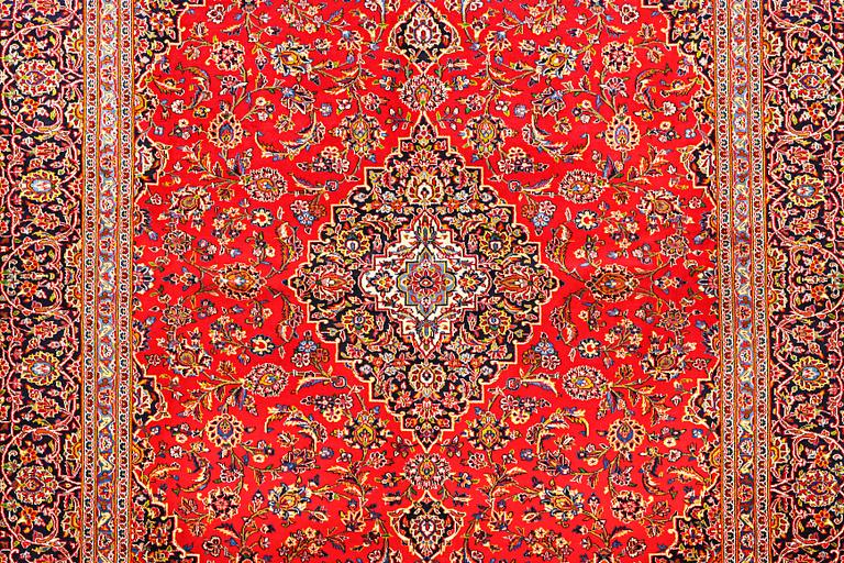A Kashan carpet, c. 388 x 295 cm.