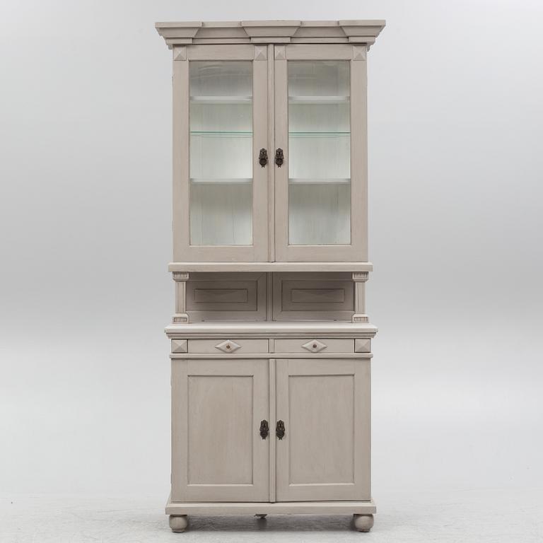 A two-part cabinet, around 1900.