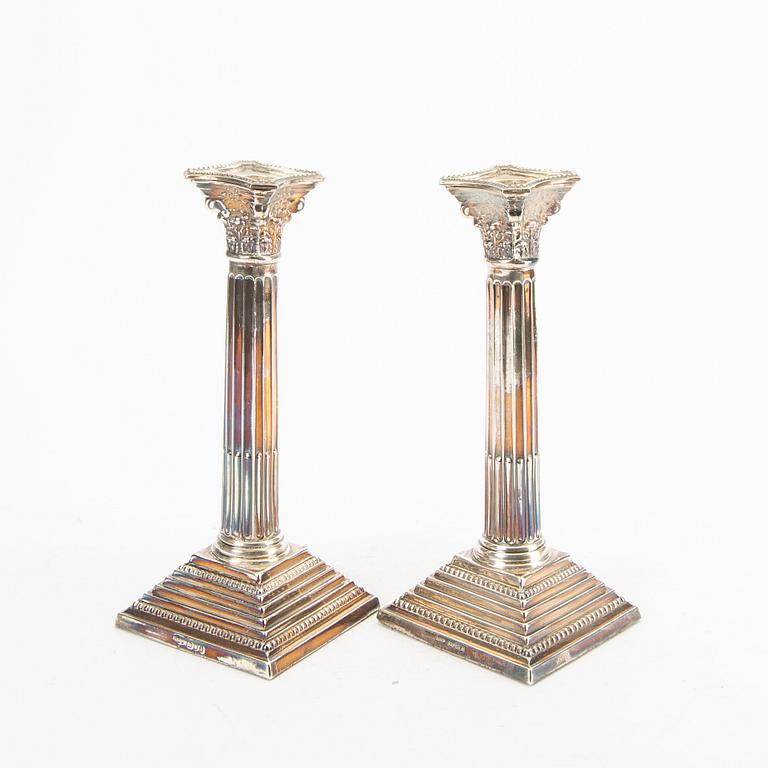 A pair of 20th century English silver candle sticks London 1965.