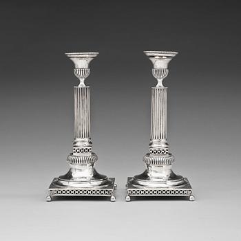 1016. A pair of Swedish 18th century silver candlesticks, marks of Petter Eneroth 1796.