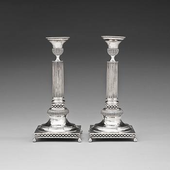 1016. A pair of Swedish 18th century silver candlesticks, marks of Petter Eneroth 1796.