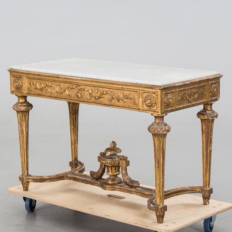 A LOUIS SEIZE STYLE CENTER TABLE.