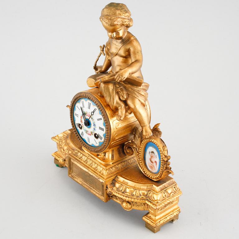 A Louis XVI style table clock, around the year 1900.