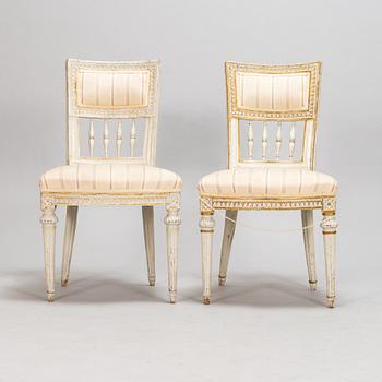 A pair of gustavian chairs made in Lindome by Johannes Andersson (1763-1840), signed IAS+, around the year 1800.