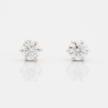 A pair of platinum earrings set with round brilliant-cut diamonds total weight 2.00 cts D if (internally flawless).