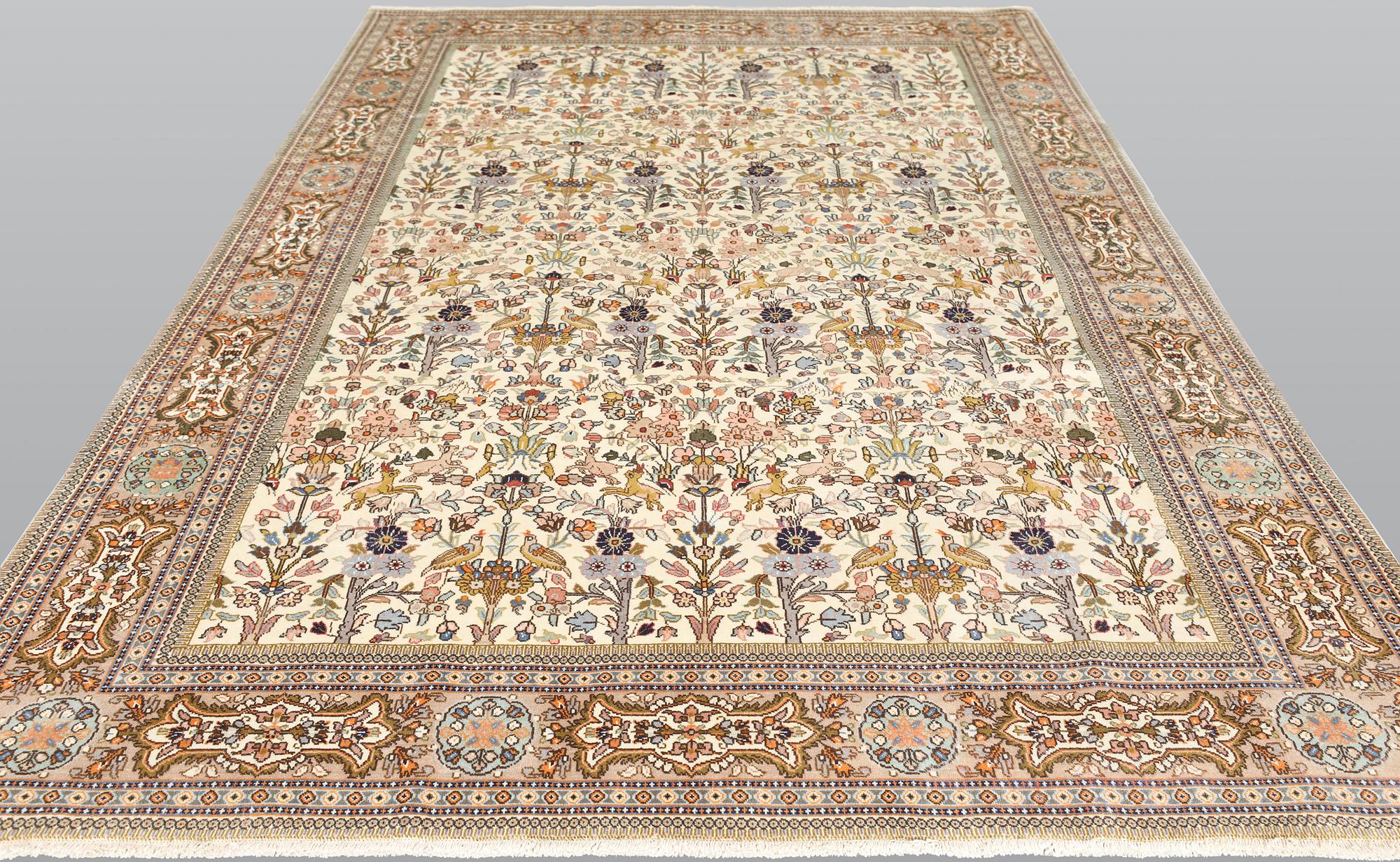 A Täbriz Tabatabai carpet, c.  352 x 240 cm.