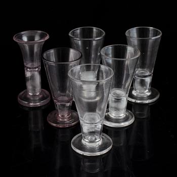 Six similar 18th century wine glasses.