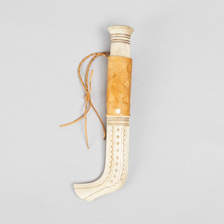 Lars Sunna, a reindeer horn knife, signed.