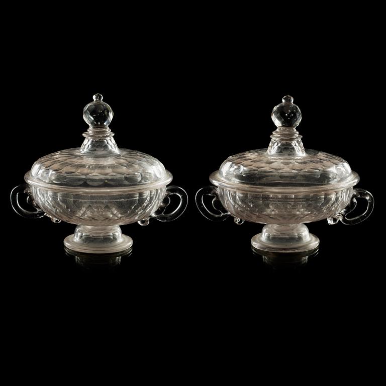 A pair of cut glas butter tureens with cover, 18th Century.