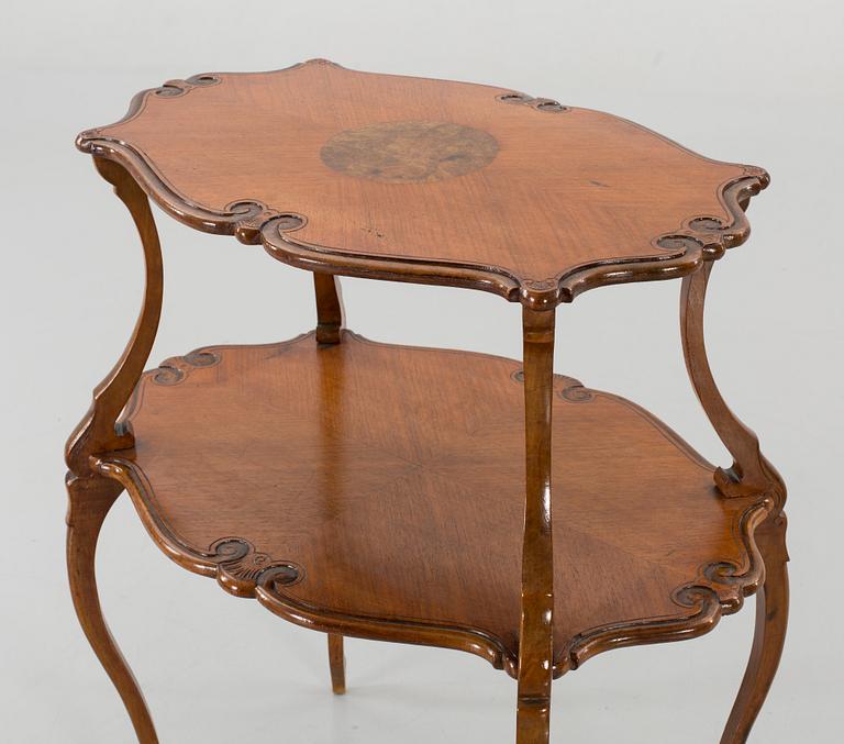 A Louis XV-style serving table, first half of the 20th century.