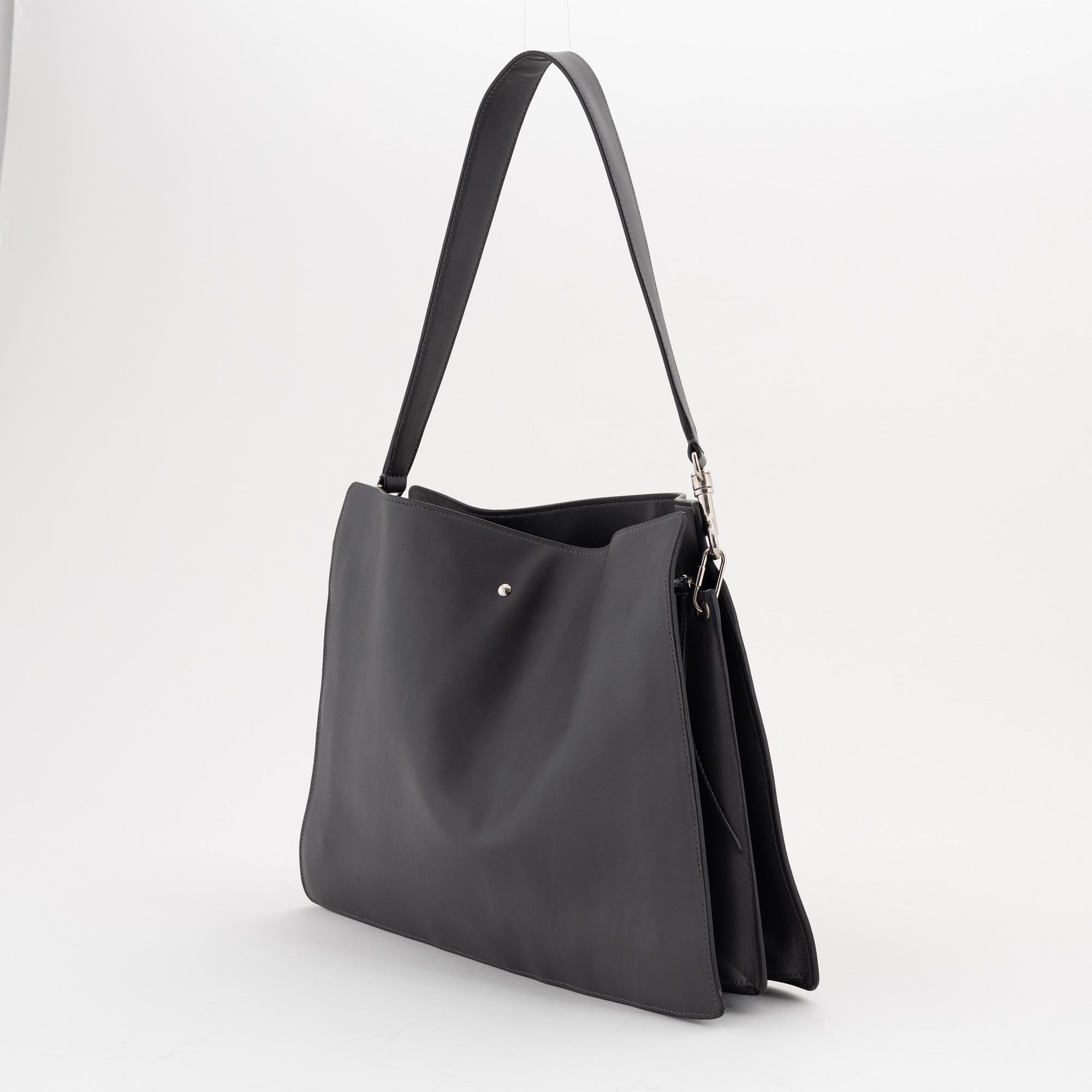 Céline, a grey leather handbag.