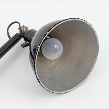 A industrial wall lamp 'Stella' from the first half of the 20th century.