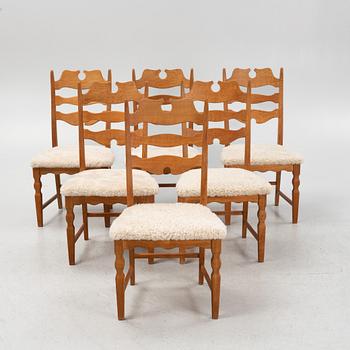 Henning Kjærnulf, a set of six oak 'Razorblade' chairs with new sheepskin upholstery, EGK, Denmark 1960s.