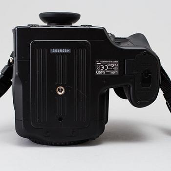 A black body medium format Pentax 645D camera with a SMC Pentax-D FA 645 55mm F2.8 AL [IF] SDM AW lens.