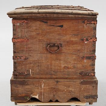 A carved oak chest with wrought iron fittings, 19th Century.