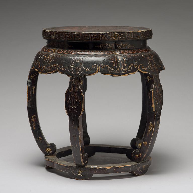 A wooden barrel shaped stool, late Qing dynasty, circa 1900.