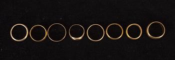 RINGAR, 8 st, guld, 1900-tal. Vikt ca 43,2 g.