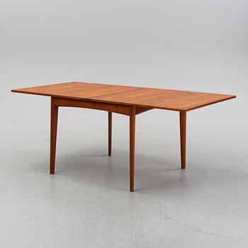 A teak dining group, table and six chairs model no. 49, designed by Erik Buch, Denmark, in 1949.