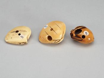 A set of eight Japanese ivory and bone Netsukes, Meiji period.